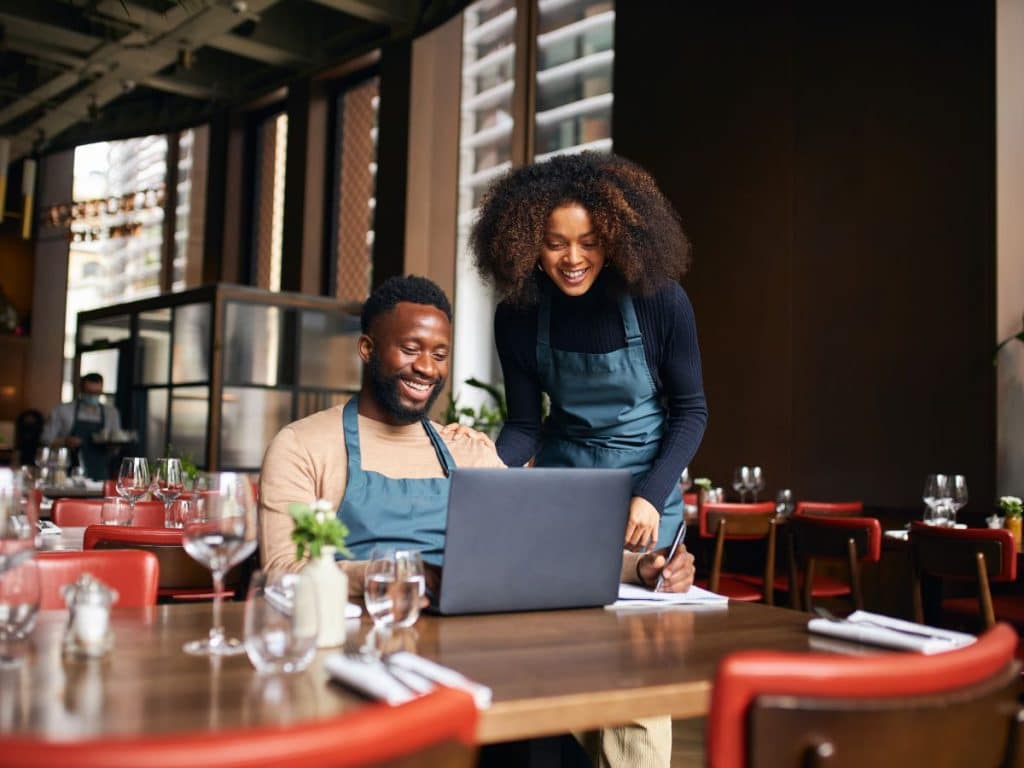 How-to-Get-a-Loan-to-Buy-an-Existing-Business-TEDC-Creative-Capital Two people meeting