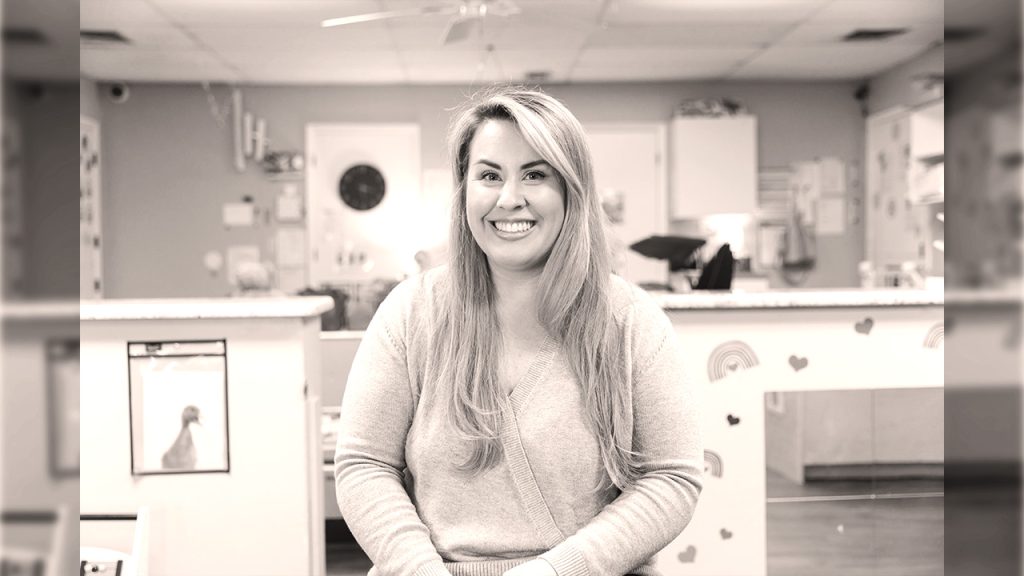 Whitney McCrory sitting at Legacy Childhood Education Centers