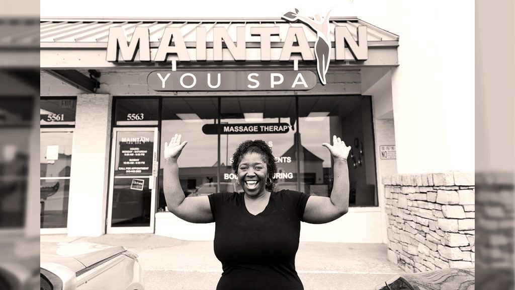 Claudette Wallace smiling outside of Maintain You Spa